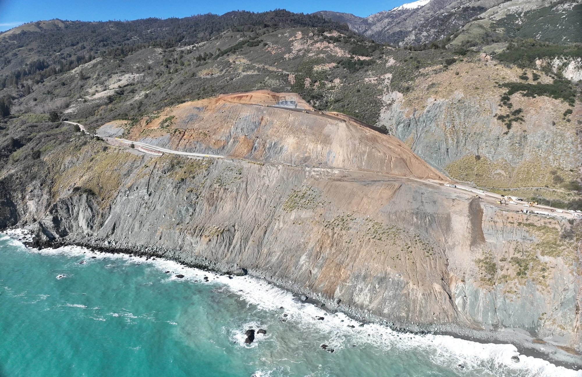 Aerial view of Highway 1 crossing a reconstructed landslide