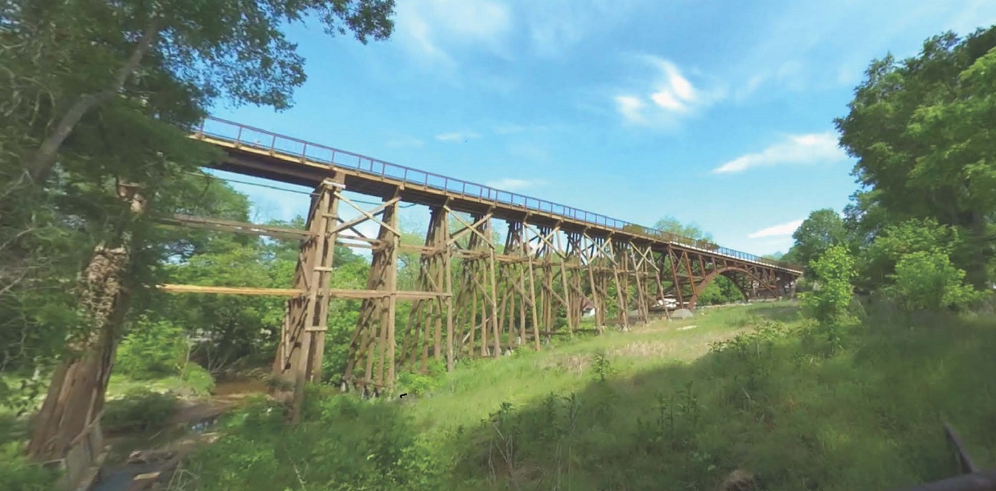 photo of Firefly trail crossing with rebuilt wood trestle and arch crossing