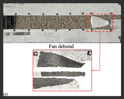 Grayscale image of a long test specimen with measurement markers, highlighting damage at the right end with a dashed red box