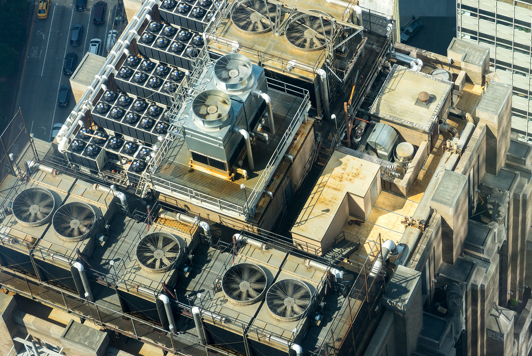 Rooftop mechanical equipment and HVAC units atop a large commercial building