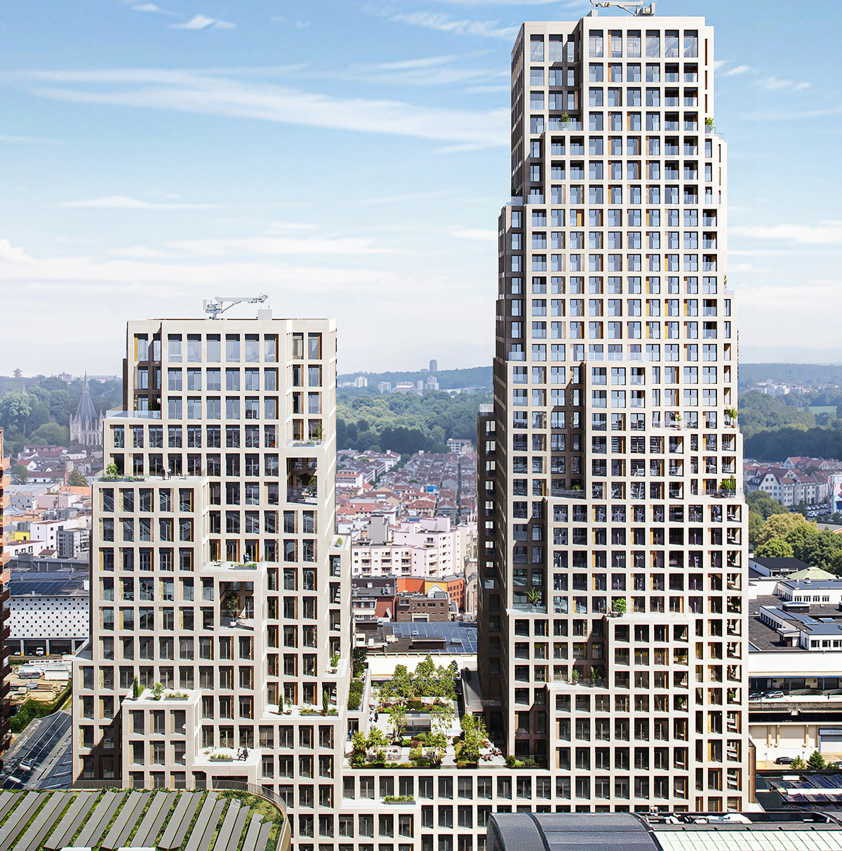 Dual towers connected by a multi-story podium in Brussels