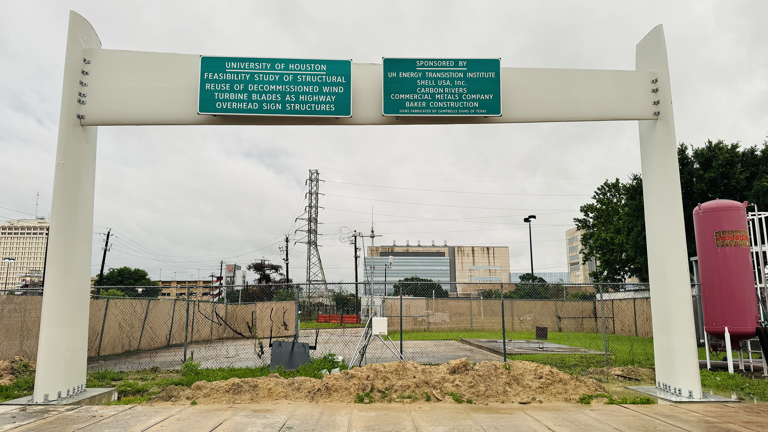 Completed highway sign structure built from repurposed wind turbine blades