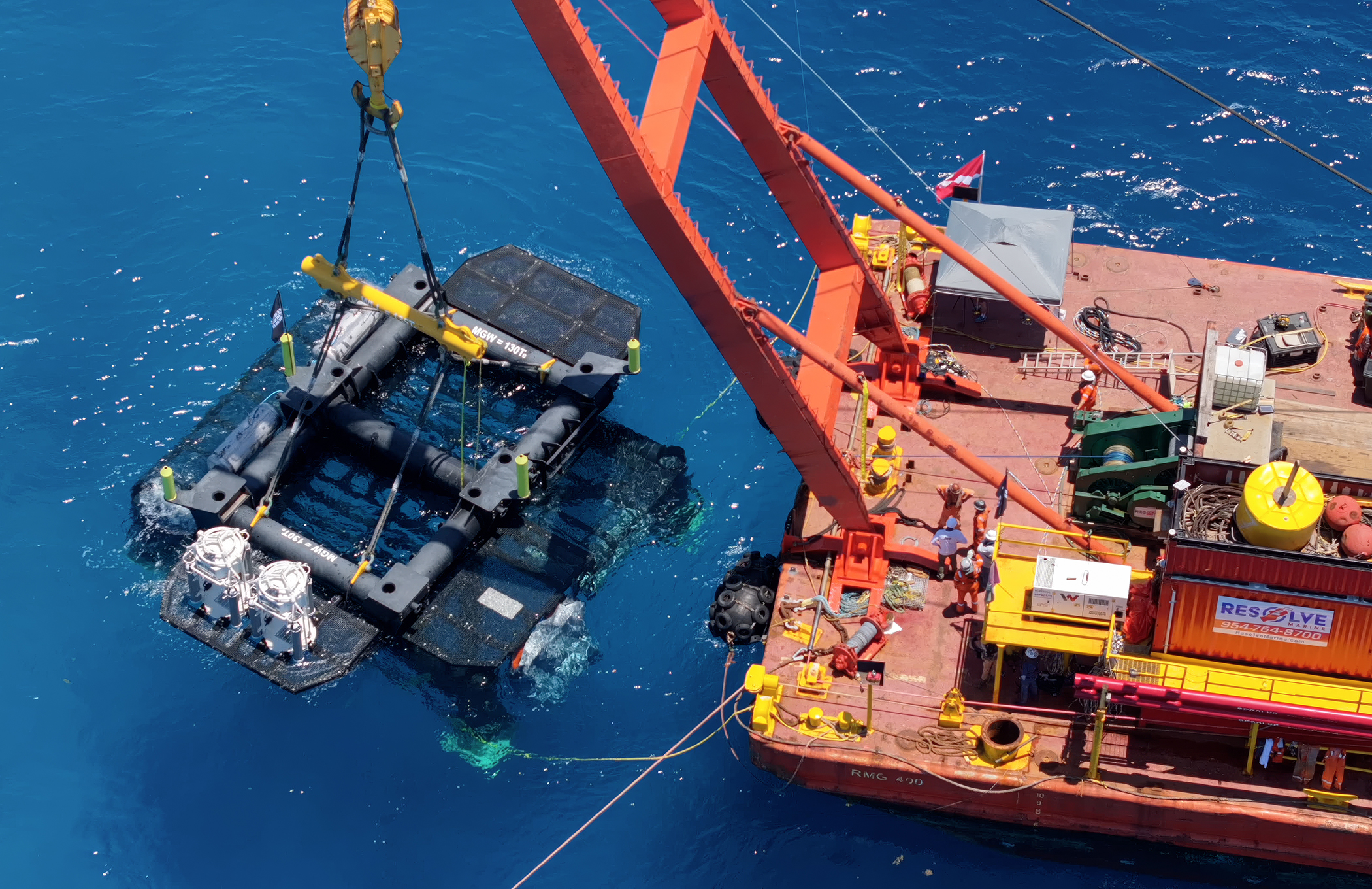 Crane barge lowers Vanguard habitat onto seabed foundation