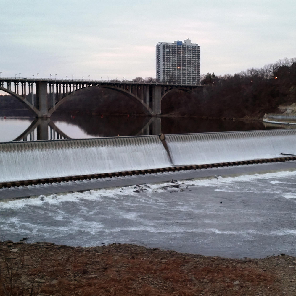 Dam and bridge spanning the Mississippi River