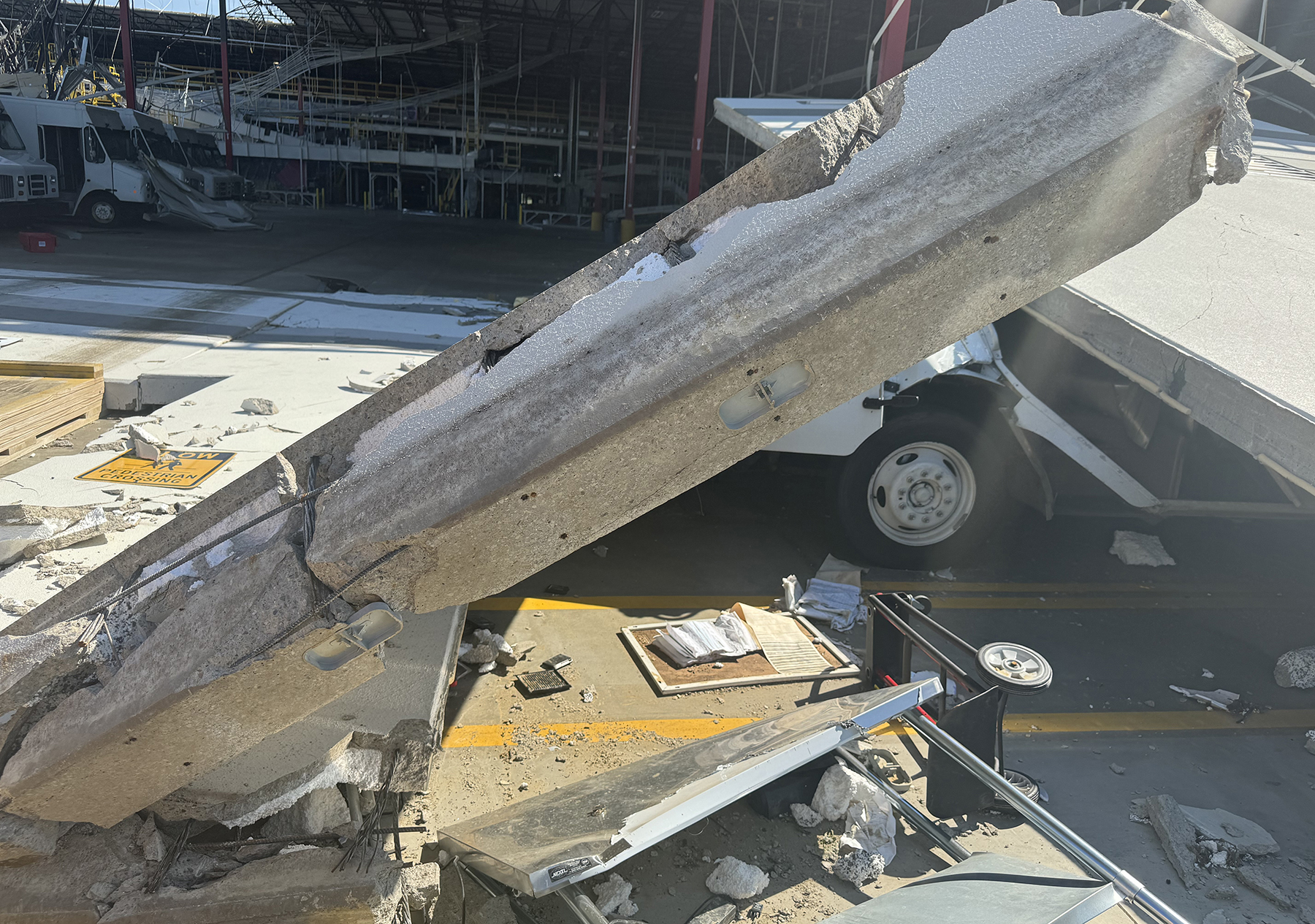 Failed precast wall panel at tornado-damaged FedEx warehouse