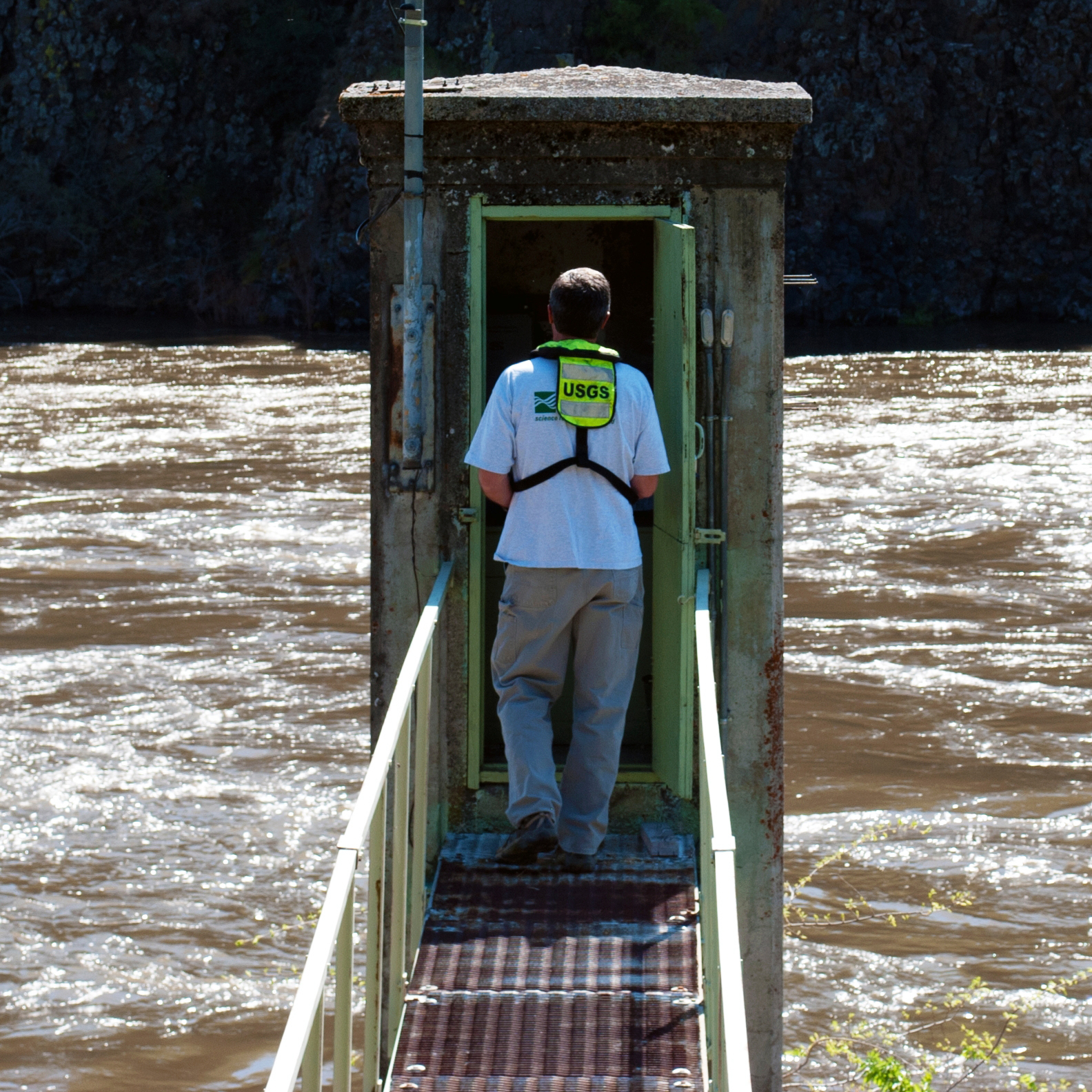 USGS streamgage station above river in rocky canyon