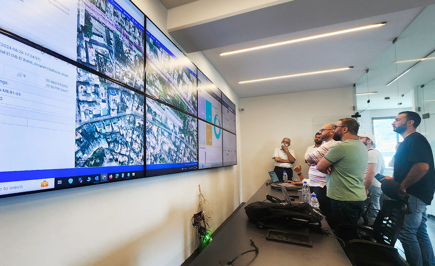 Operators monitor fleet-tracking and traffic data on video screens