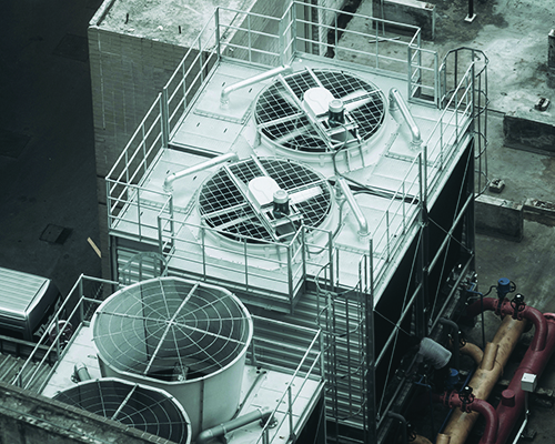 An aerial look at a building's rooftop HVAC equipment