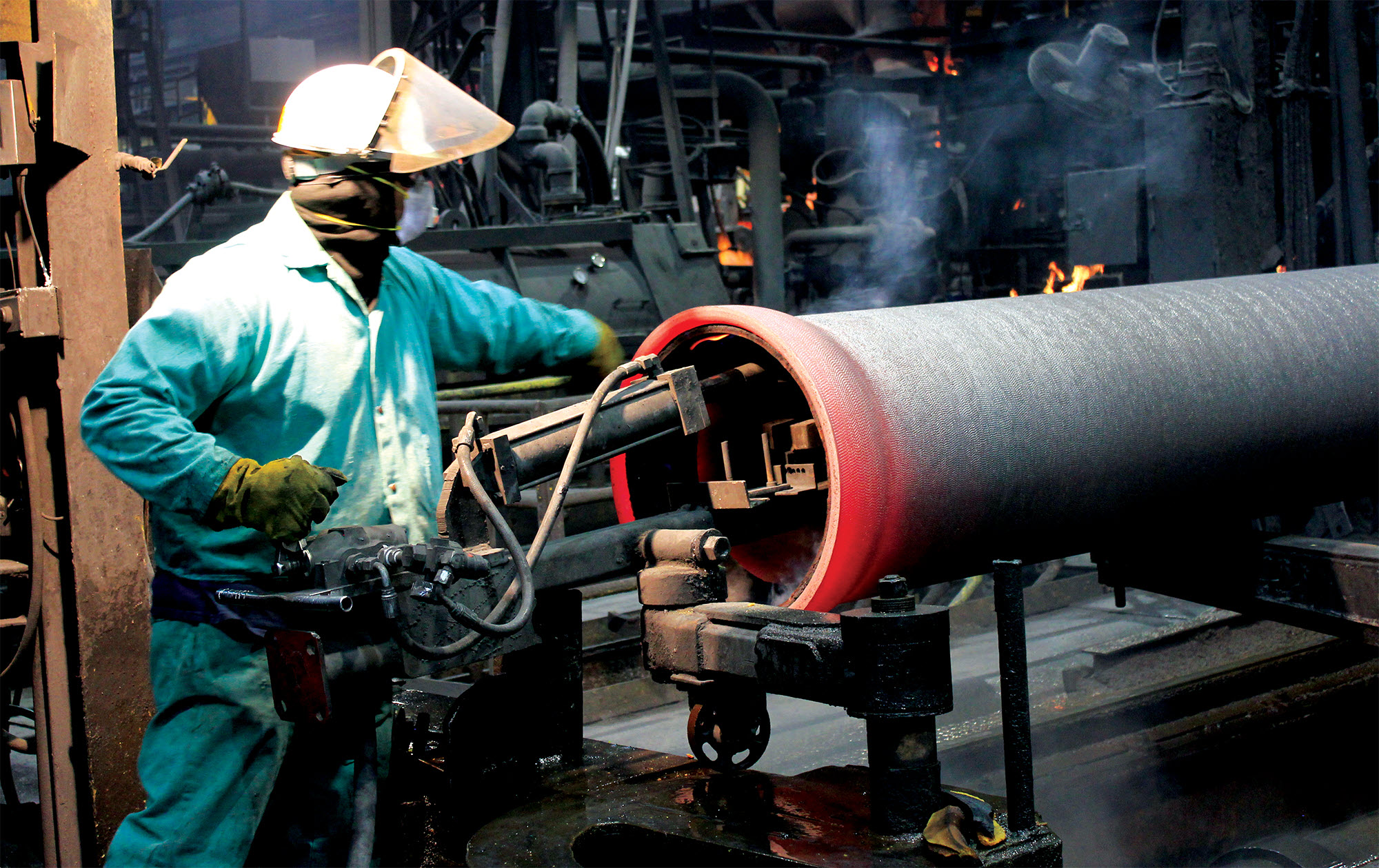 photo of engineer working on pipe